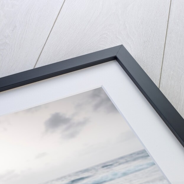 Tranquil beach with cloudscape by Assaf Frank